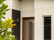 Private duplex with North facing yard and SIDE ACCESS....