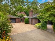 Private Paradise: Lush Gardens, Creek Views and Poolside...