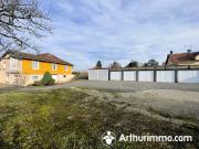 Proche A36, commodités, 12 garages loués, bien située....