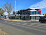 PROMINENT CORNER BUILDING