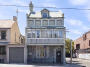 Prominent mixed use terrace in prime corner position