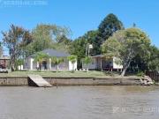 Propiedad con 2.500 m2 con 25 metros sobre Rio Lujan....