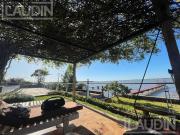 Propiedad Única con Playa Privada y Muelle sobre el Río...