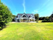 Propriété en bord de mer avec jardin