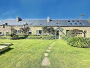Propriété en bord de mer avec jardin