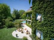 Propriété avec piscine et jardin