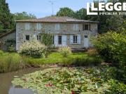 A 5mn de Montendre propriété en pierre de plain pied...