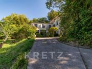 Propriété de 429m² sur 8500m² de terrain en centre ville