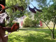 Propriété en bord de mer avec jardin
