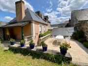 Propriété en bord de mer avec jardin