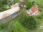 Propriété en pierre avec dépendances et 3 hectares à 20...