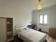 Quarto acolhedor em apartamento com 7 quartos em...