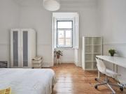 Quarto acolhedor em apartamento de 8 quartos em Arroios,...