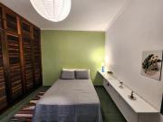 Quarto Green confortável para longa temporada