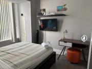 Queen Bed | Yonge Street view | 3 Star Amenities Has a Place
