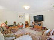 Quiet Court Living Three Bedroom Home with Double Carport