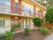 QUIET, SECURE AND TUCKED AWAY IN ONE OF THE BEST STREETS...