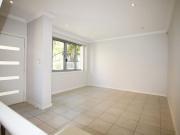 Quiet Secure Tri level Townhouse with Distant City View...