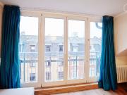 Quiet Top Floor Studio with Skyline Views in City...