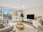 Quietly Positioned with Townhouse Scale Proportions