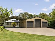 RARE CREEKSIDE LIVING WITH SPACE, PRIVACY AND WATER VIEWS!