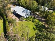 Rare Elevated Opportunity in Acreage Tallai Dual Living...