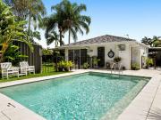 Rare Single Level Duplex Oasis with Pool, Space & Style
