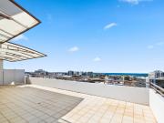 Rare Split Level Penthouse with Panoramic Ocean Views in...