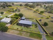 Modern & Stylish Family Home on 4.5 Acres A Rare In Town...