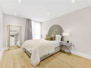 Recently refurbished three bedroom apartment in a high...