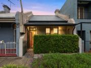 Refined 5m wide period home with rear lane parking access