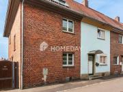 Reihenmittelhaus mit Gartenidylle & überdachter Terrasse...