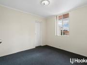 Relaxed Riverside Living with Balcony Views