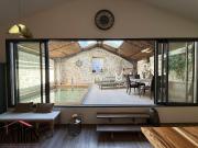 Remise rénovée avec deux logements locatifs indépendants...