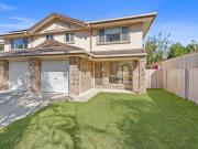 RENOVATED 3 BEDROOM TOWNHOUSE WITH AIR CON IN GATED COMPLEX!