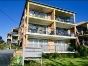 Renovated beachfront unit with stunning views!