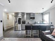 Renovated Open Concept 2 Bed 1 Den 2 Bath Unit Steps...