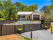 Renovated Queenslander with Water Views & Dual Street Access