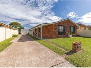 Renovated & Ready Coastal Living Just Moments from the Water