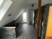 Renovierte Dachgeschosswohnung mit Balkon in ruhiger...