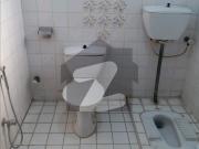 Reserve A Centrally Located House Of 1 Kanal In Faisal...