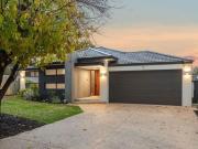 Resort Inspired Elegance in a Coveted Riverside Enclave