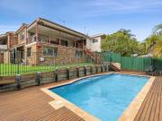 Resort like family entertainer with leafy vistas and a pool