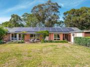 Retreat Style Living in Singleton Heights!