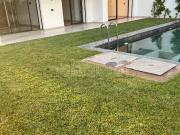 Rez de jardin avec piscine à louer