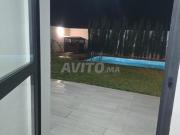 Rez de jardin avec piscine privative