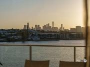 Riverfront Luxury with Panoramic City Views