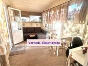 ROMANINA BILOCALE ARREDATO CON GIARDINO E VERANDA