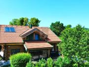 ROMANTISCHES UND MODERNES NATURSTAMMBLOCKHAUS MIT NEUEM...