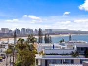 Rooftop Entertaining with Ocean Views – Steps from the Beach